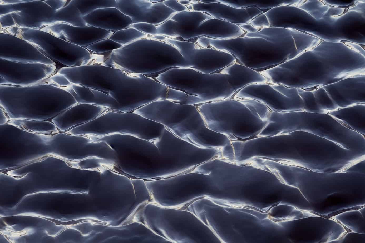 A flash flood created an expanse of wet rippled sand in Death Valley National Park (California).